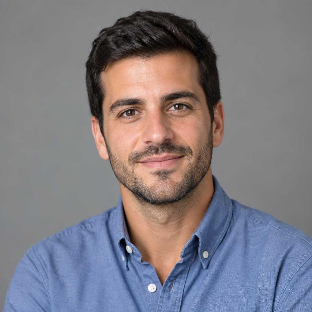 Studio portrait of a Portuguese man in his 30s, investigative reporter